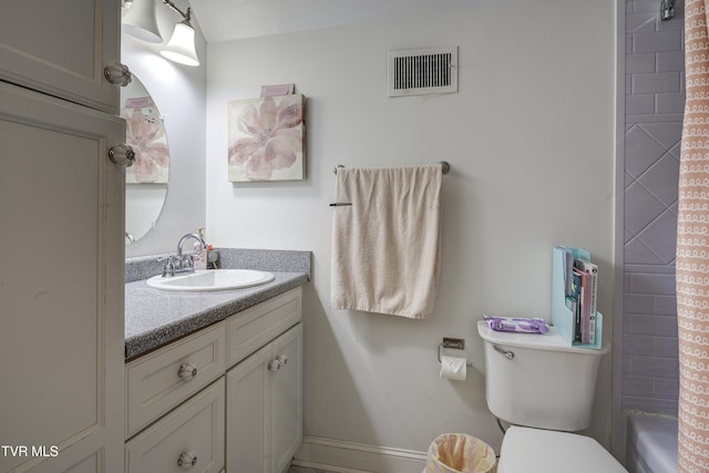 full bathroom with vanity, toilet, and shower / bath combo with shower curtain