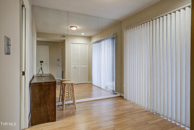 hall featuring light hardwood / wood-style flooring