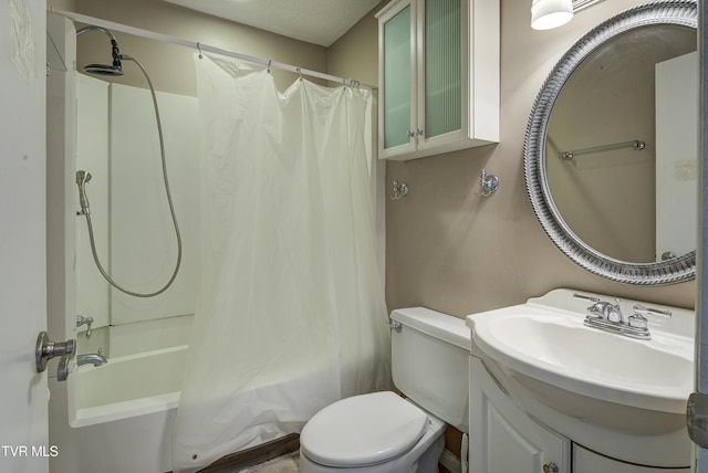 full bathroom with shower / tub combo, vanity, and toilet