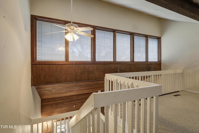 interior space featuring ceiling fan