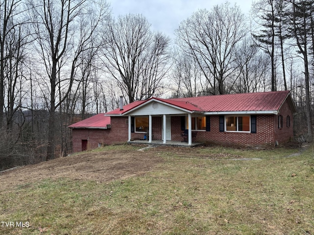 358 Wagon Trl, Haysi, VA 24256 - single story home featuring covered porch and a front lawn