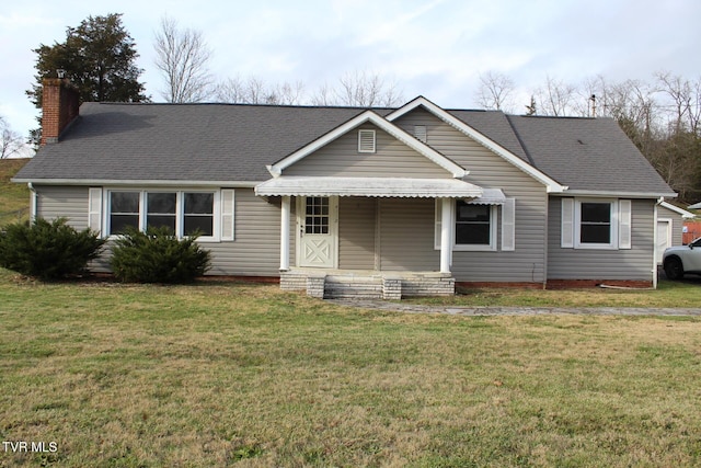 view of front of home with a front lawn