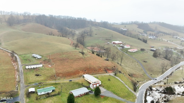 birds eye view of property featuring a rural view