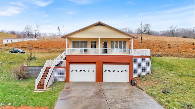 view of front facade featuring a garage and a front lawn