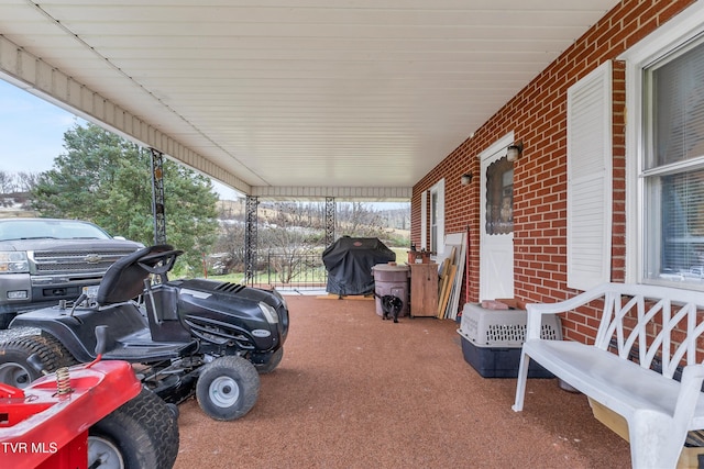 view of patio / terrace with a carport and grilling area