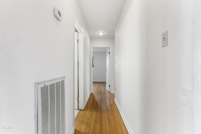 hallway featuring light hardwood / wood-style flooring