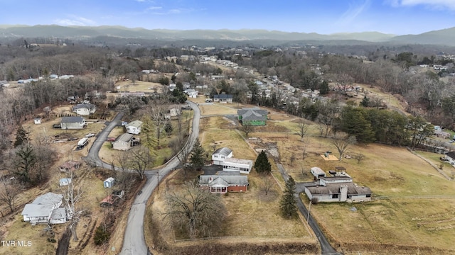 drone / aerial view featuring a mountain view