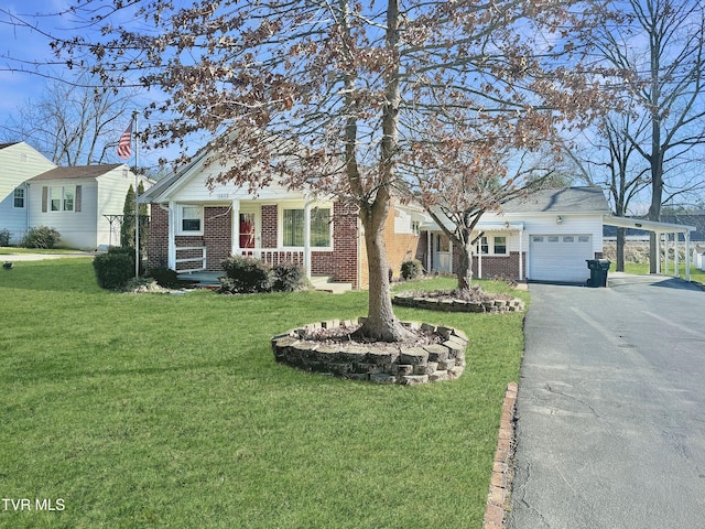 view of front facade with a front yard, a porch, and a garage