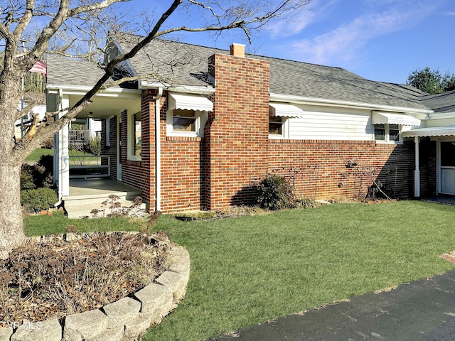 view of home's exterior featuring a lawn