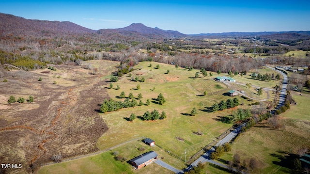 aerial view with a mountain view and a rural view