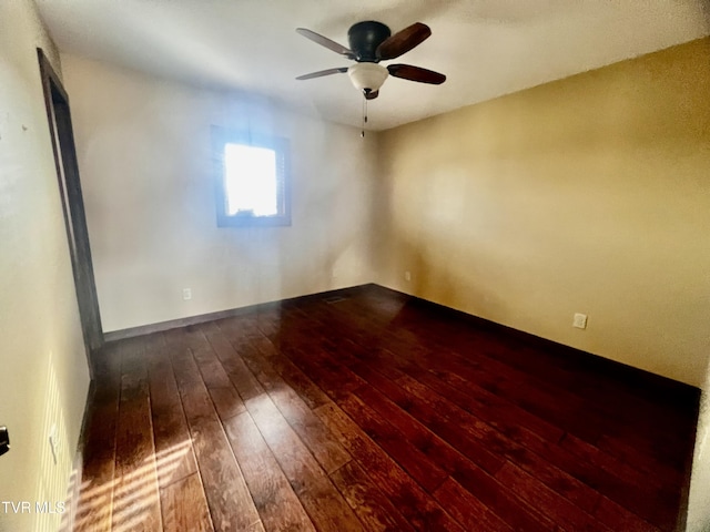 spare room featuring ceiling fan and wood-type flooring