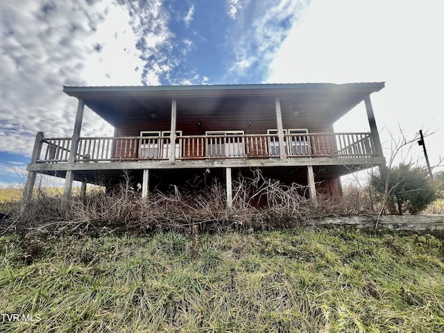 back of property with a deck