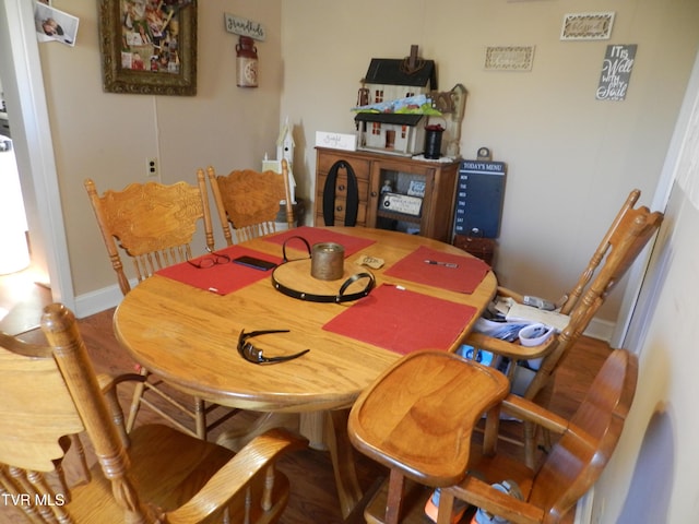 dining area featuring hardwood / wood-style flooring