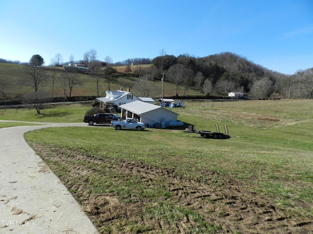 exterior space with a rural view