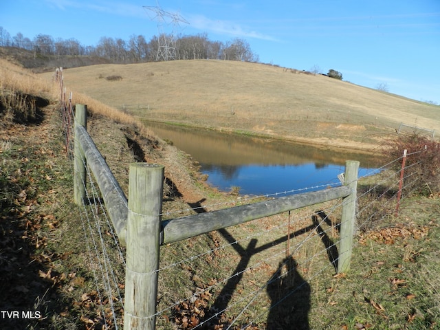 property view of water with a rural view