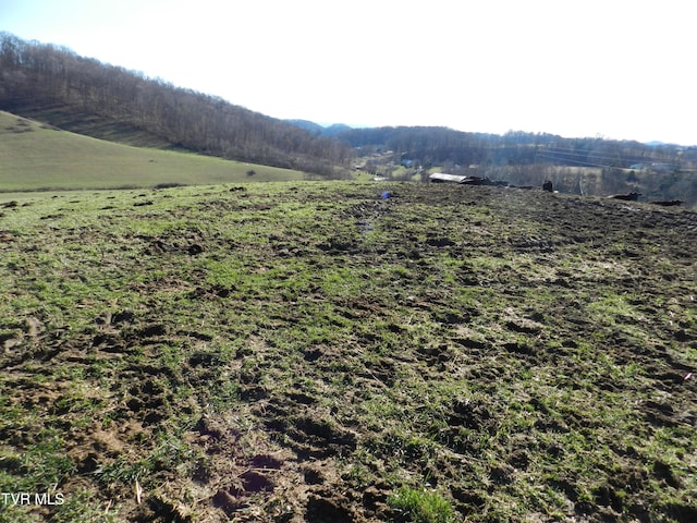 property view of mountains featuring a rural view