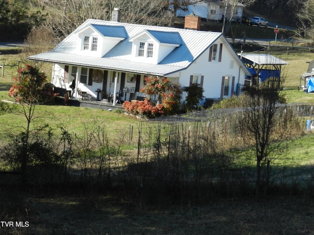 back of property with covered porch