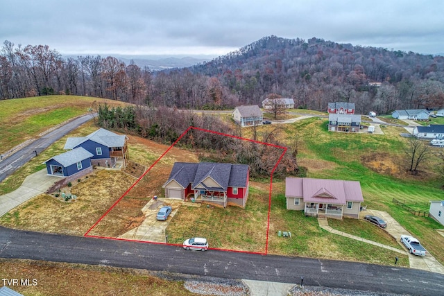 bird's eye view with a mountain view