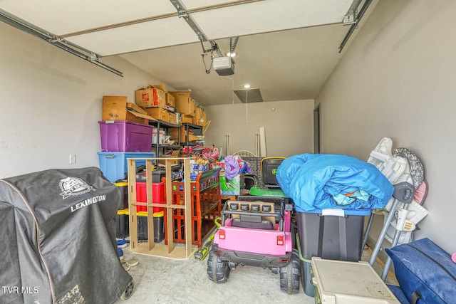 garage featuring a garage door opener