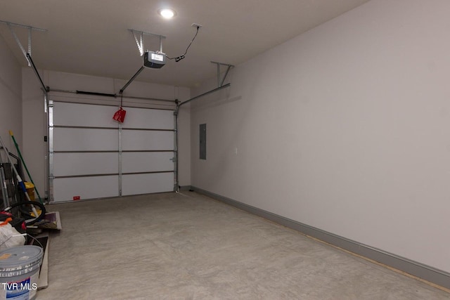 garage featuring electric panel and a garage door opener