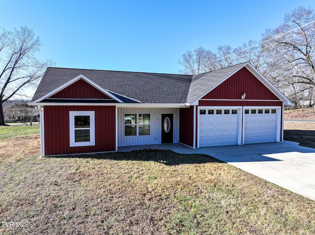 single story home with a garage and a front lawn