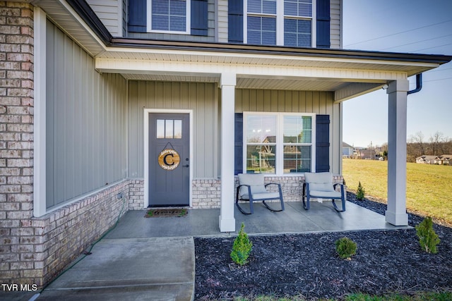 entrance to property with a porch