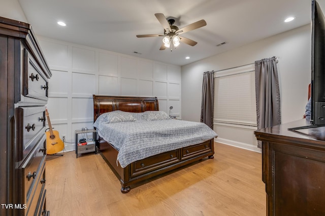 bedroom featuring ceiling fan and light wood-type flooring