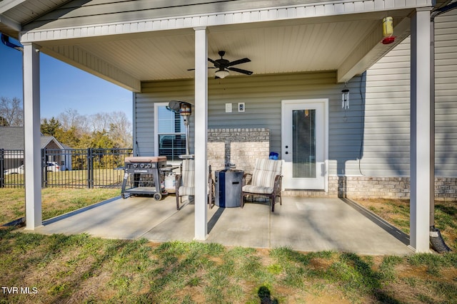 view of patio / terrace featuring ceiling fan and grilling area