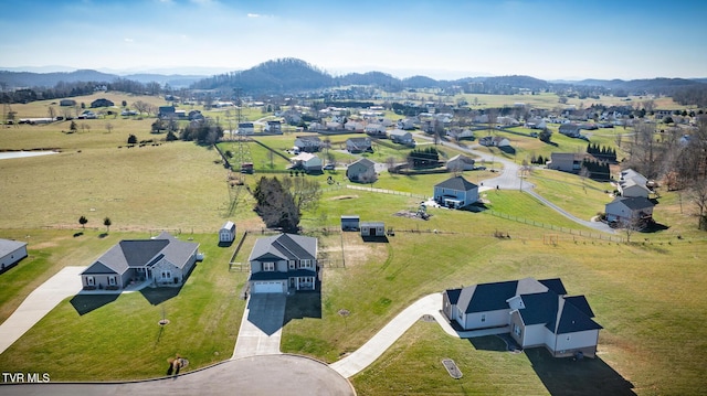 drone / aerial view featuring a mountain view