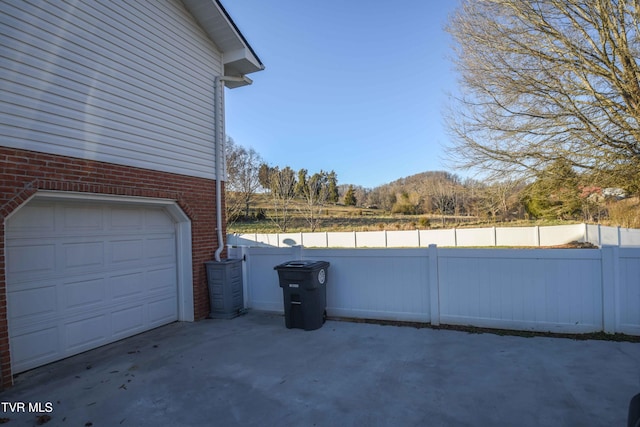 garage featuring a water view