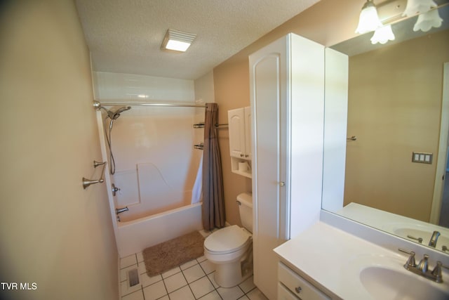 full bathroom with tile patterned floors, vanity, a textured ceiling, shower / bathtub combination with curtain, and toilet