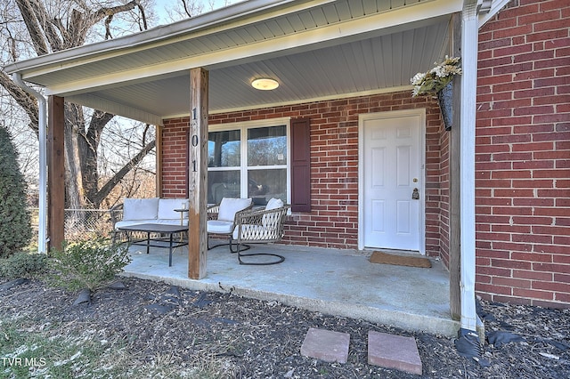 entrance to property with covered porch