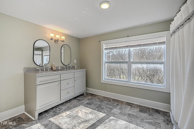 bathroom featuring vanity