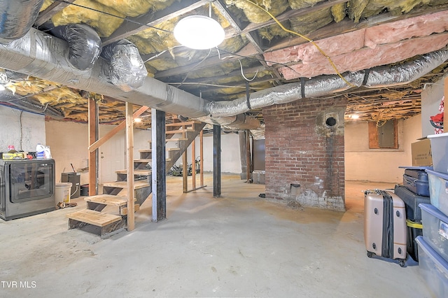 basement featuring washer / dryer and electric panel