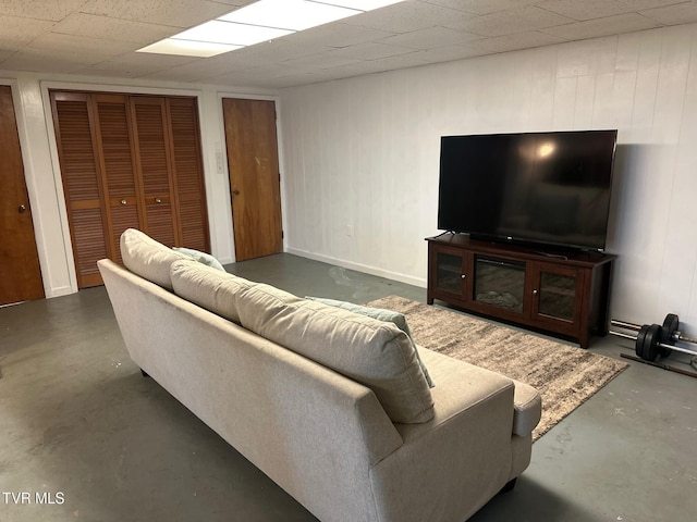 living room featuring wood walls