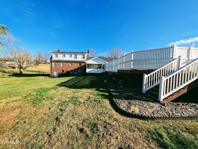 view of yard featuring a deck