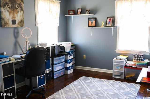 office with dark hardwood / wood-style flooring