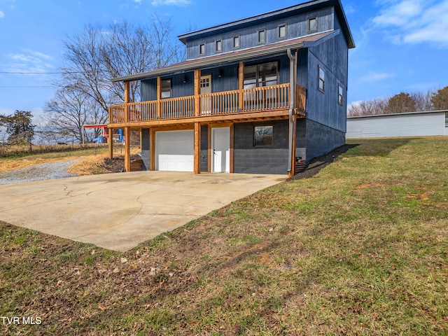 view of front facade with a wooden deck, a garage, and a front lawn