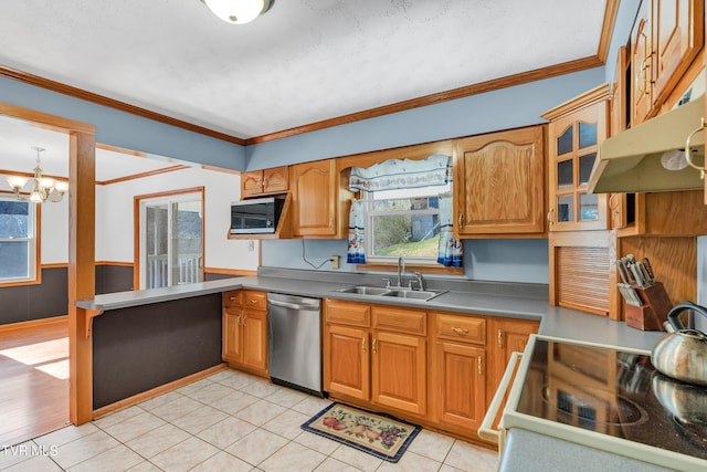 kitchen with sink, stainless steel appliances, crown molding, a chandelier, and light tile patterned flooring