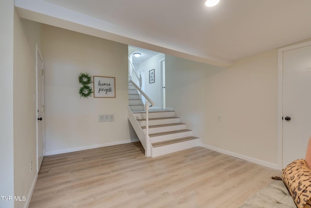 basement with light wood-type flooring