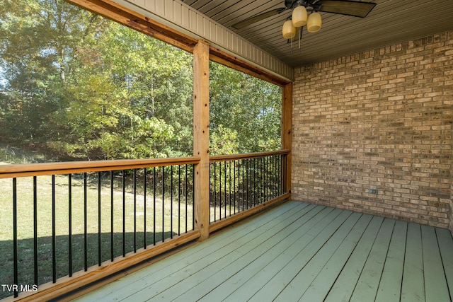 wooden deck with ceiling fan