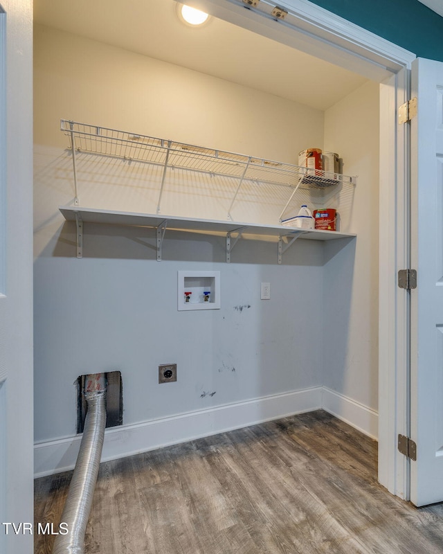 washroom featuring hookup for an electric dryer, washer hookup, and hardwood / wood-style floors