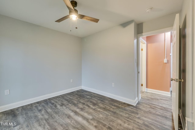 unfurnished room featuring hardwood / wood-style flooring and ceiling fan