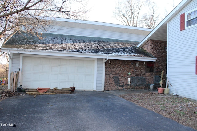 view of home's exterior with a garage