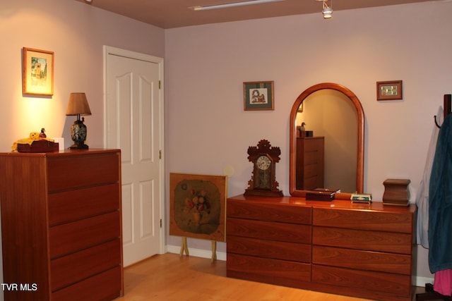 bedroom featuring light hardwood / wood-style floors