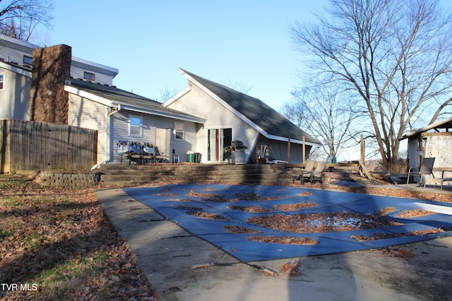 rear view of property with a patio area