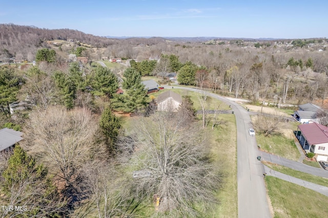 drone / aerial view with a view of trees