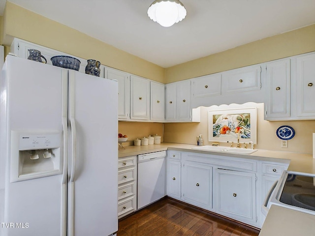 kitchen with white cabinetry, white appliances, sink, and dark wood-type flooring