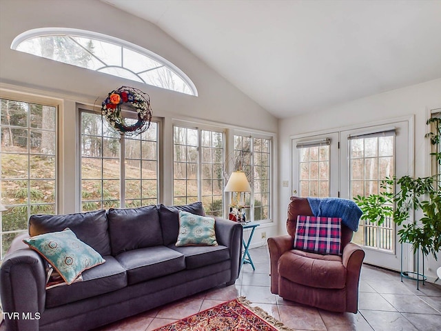 sunroom / solarium featuring french doors and lofted ceiling