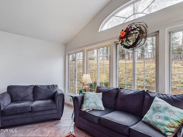 sunroom / solarium featuring vaulted ceiling